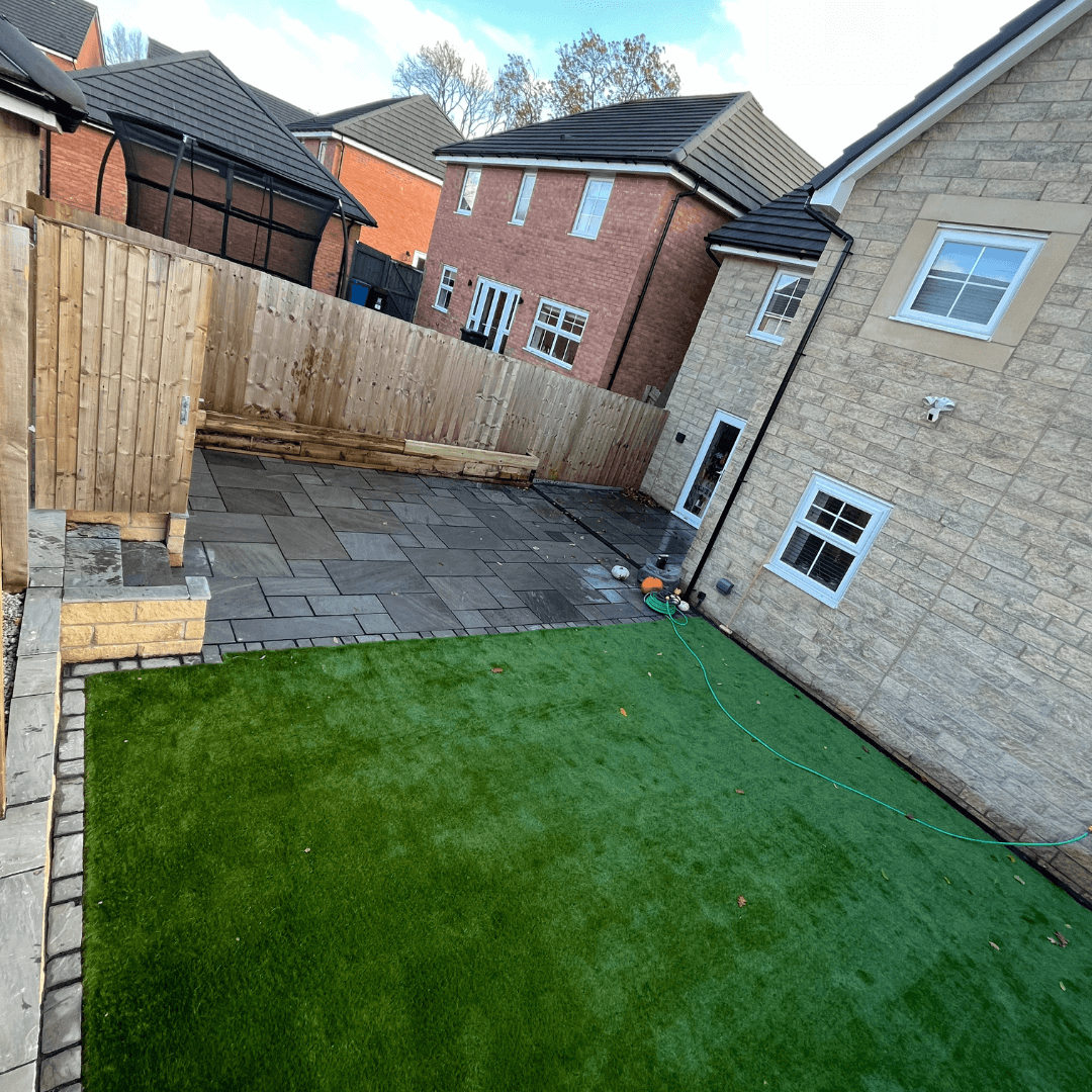 Artificial grass and indian stone finish